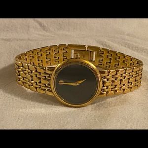 Gold Tone Movado Sapphire Crystal